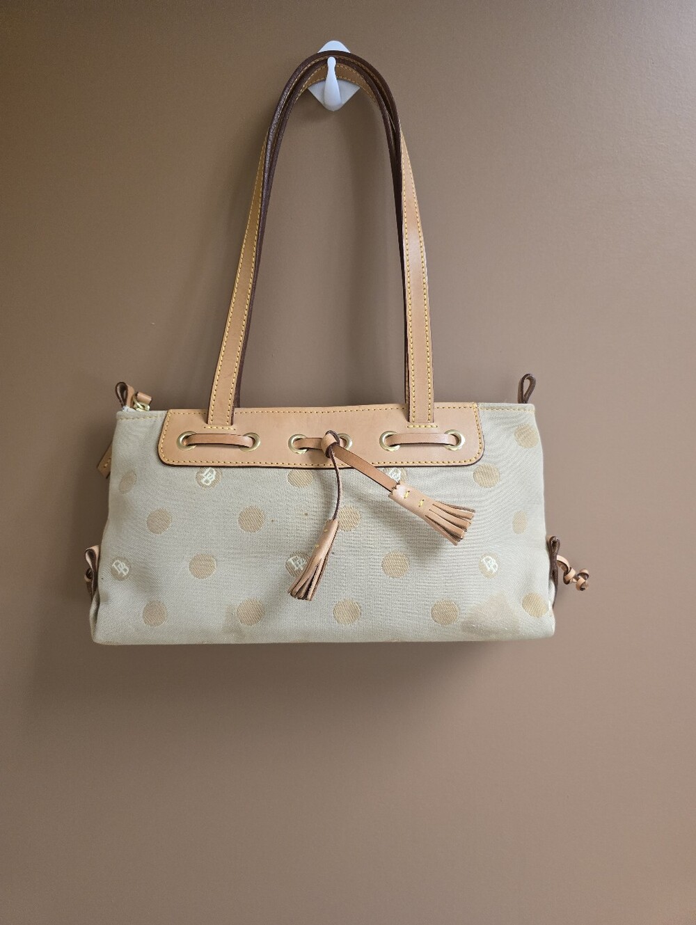 Dooney & Bourke monogram polka dot print satchel bag featuring a canvas body